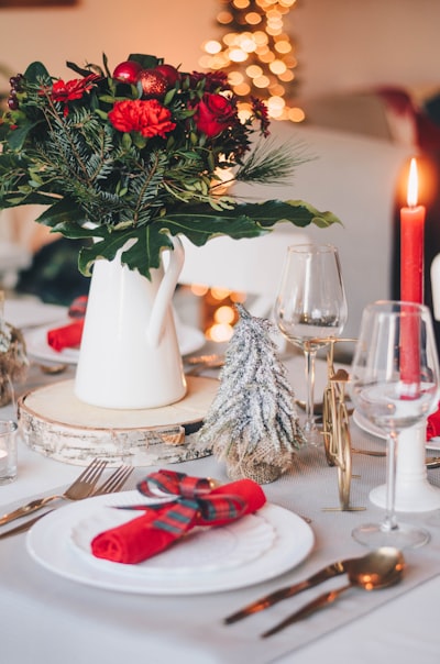 white pillar candles on white ceramic plate